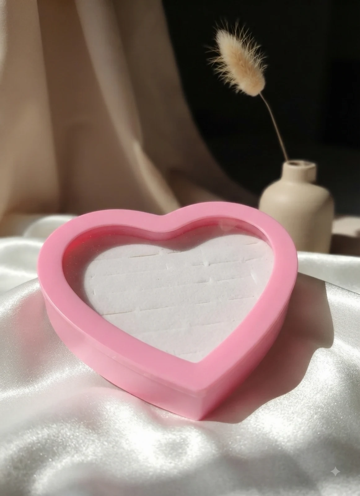EXHIBIDOR DE CORAZON PLASTICO 100