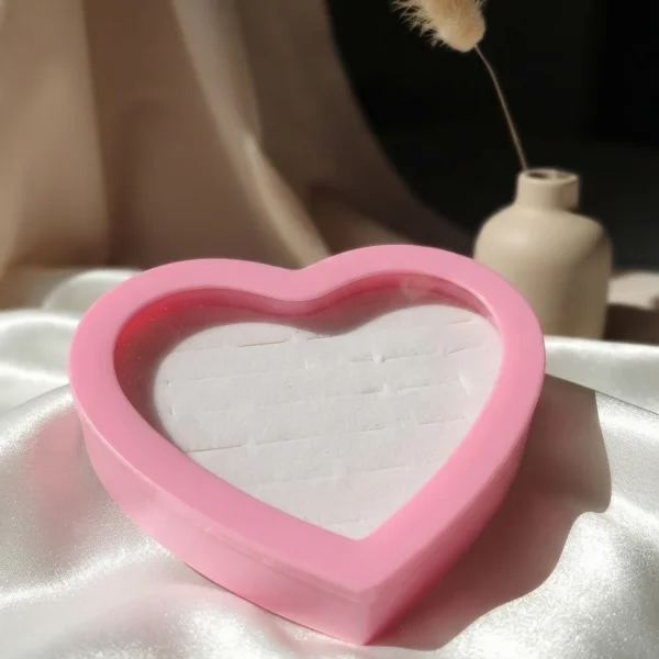 EXHIBIDOR DE CORAZON PLASTICO 100